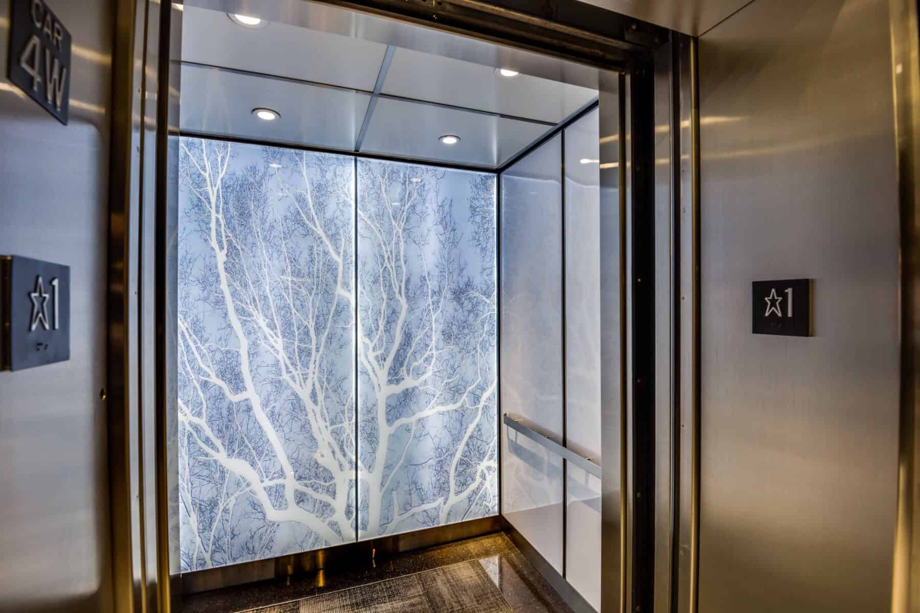 Custom Fabrication of Architectural Backlit Custom Image Glass Panels for Elevators for Construction Specialty Projects by Commercial Builder & General Contractor Structural Enterprises