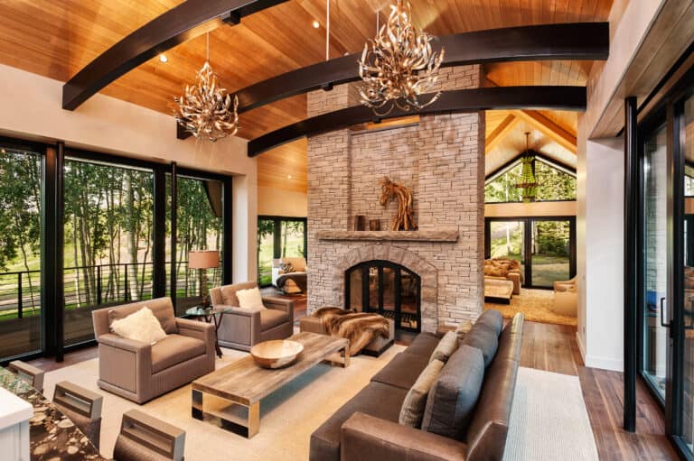 Spectacular Great Room with Stone Fireplace in Aspen, Colorado Custom Home. Luxury Home Building Interiors