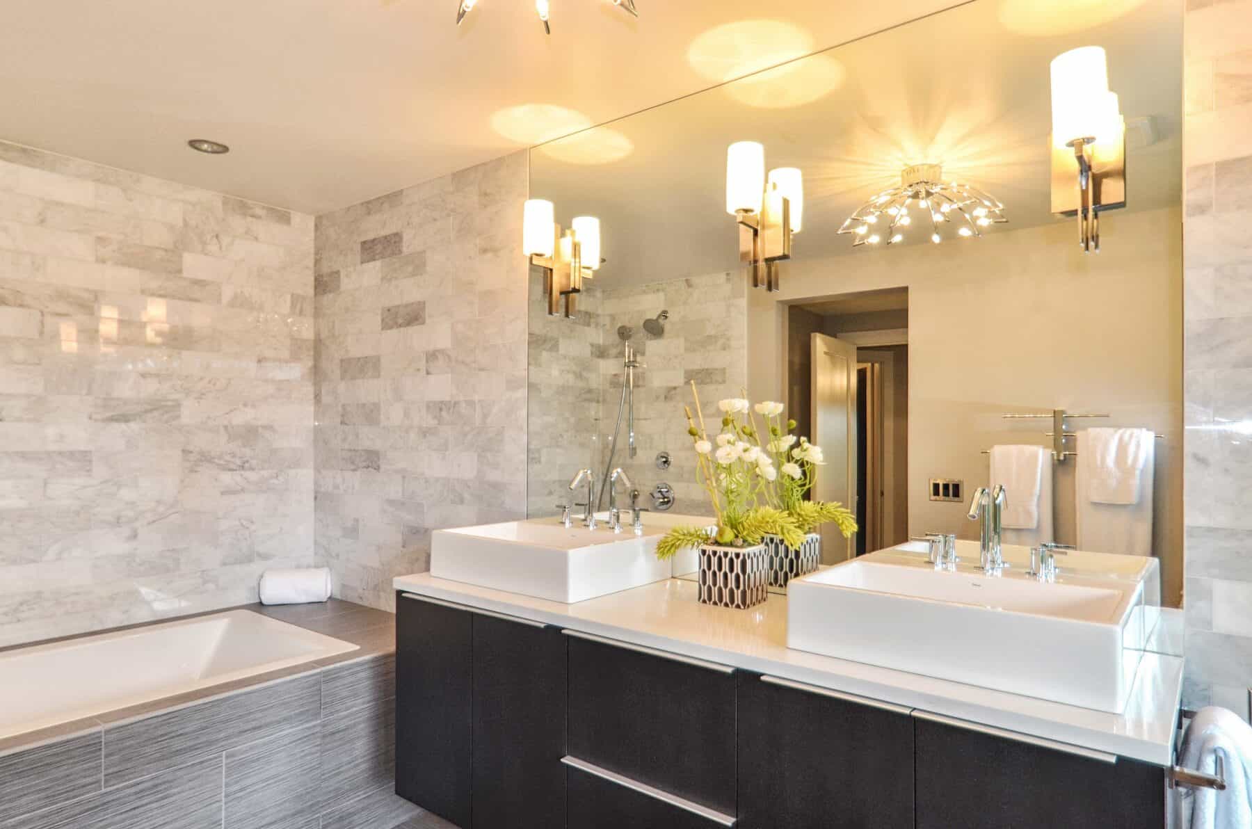 Carrera Marble and Porcelain Bathroom in Aspen, Colorado Custom Home. Luxury Home Building Interiors