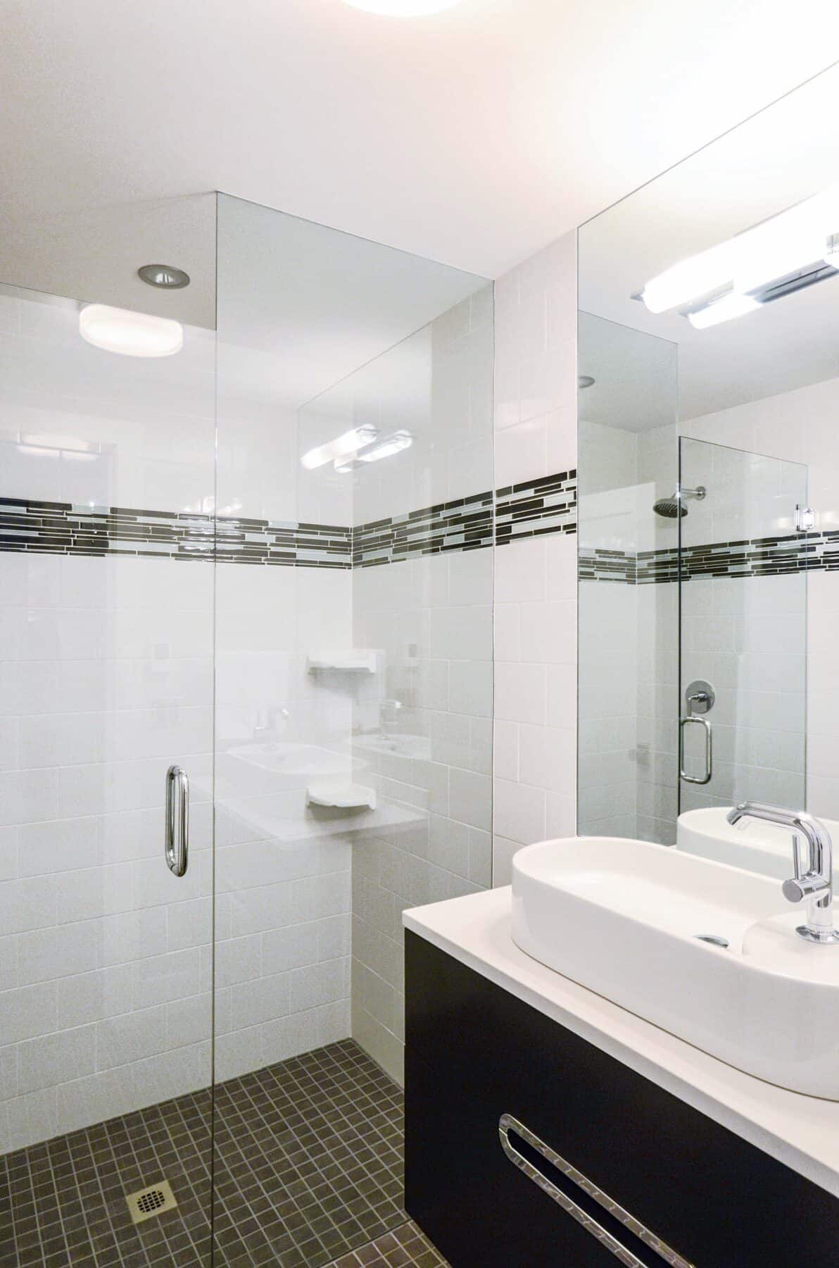 Modern Glass Shower Walls in Aspen, Colorado Custom Home. Luxury Home Building Interiors