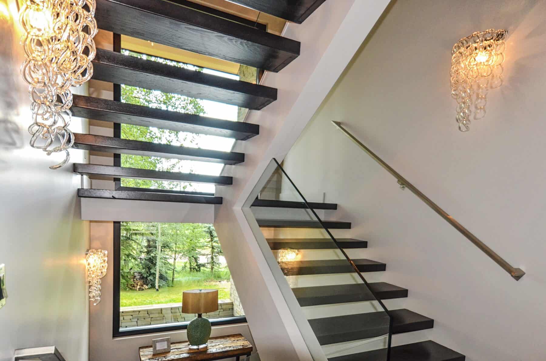 Custom Floating Modern Stair Treads in Aspen, Colorado Custom Home. Luxury Home Building Interiors