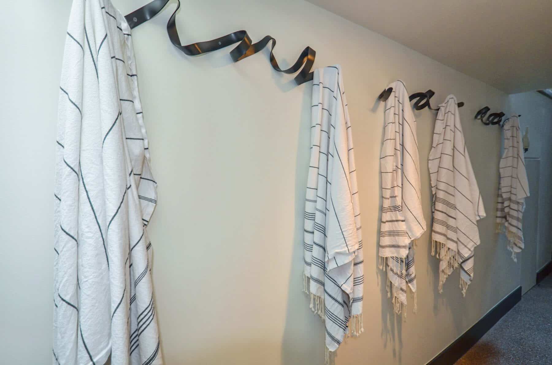 Metal Art Hooks for Turkish Towels for Swimming Pool Area in Aspen, Colorado Custom Home. Luxury Home Building Interiors