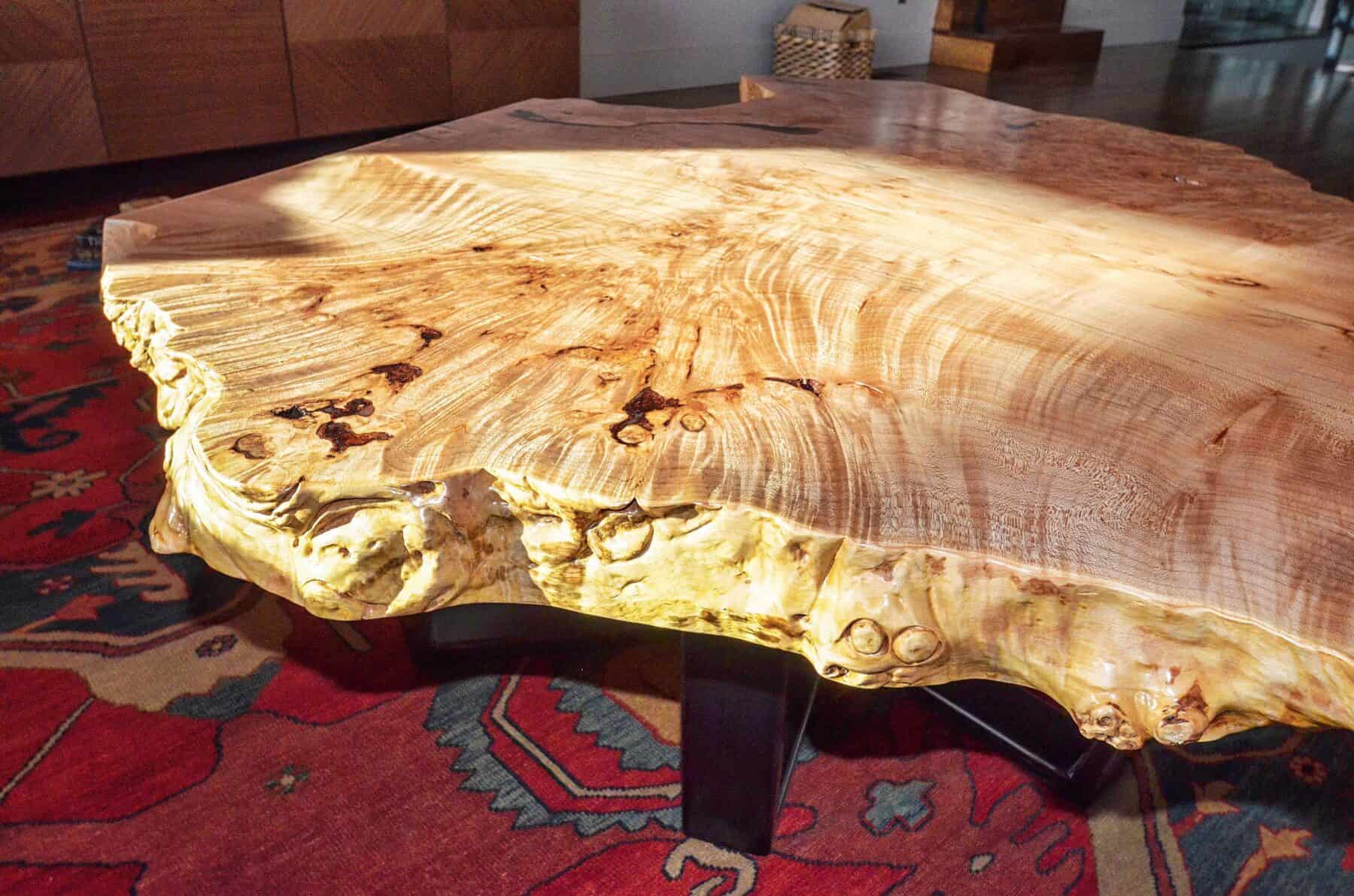Custom Giant Maple Borough Wood Coffee Table with Metal Base in Aspen, Colorado Custom Home. Luxury Home Building Interiors