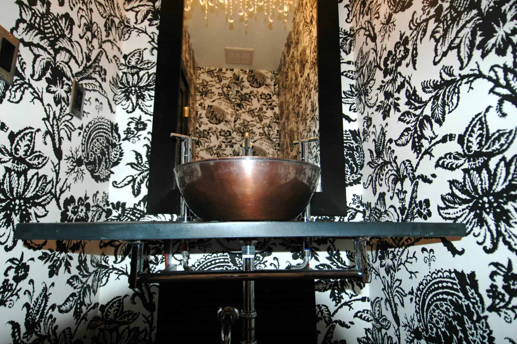 A Gorgeous Powder Room with Schumacher Black and White Wallpaper in Aspen, Colorado Custom Home. Luxury Home Building Interiors Custom Home