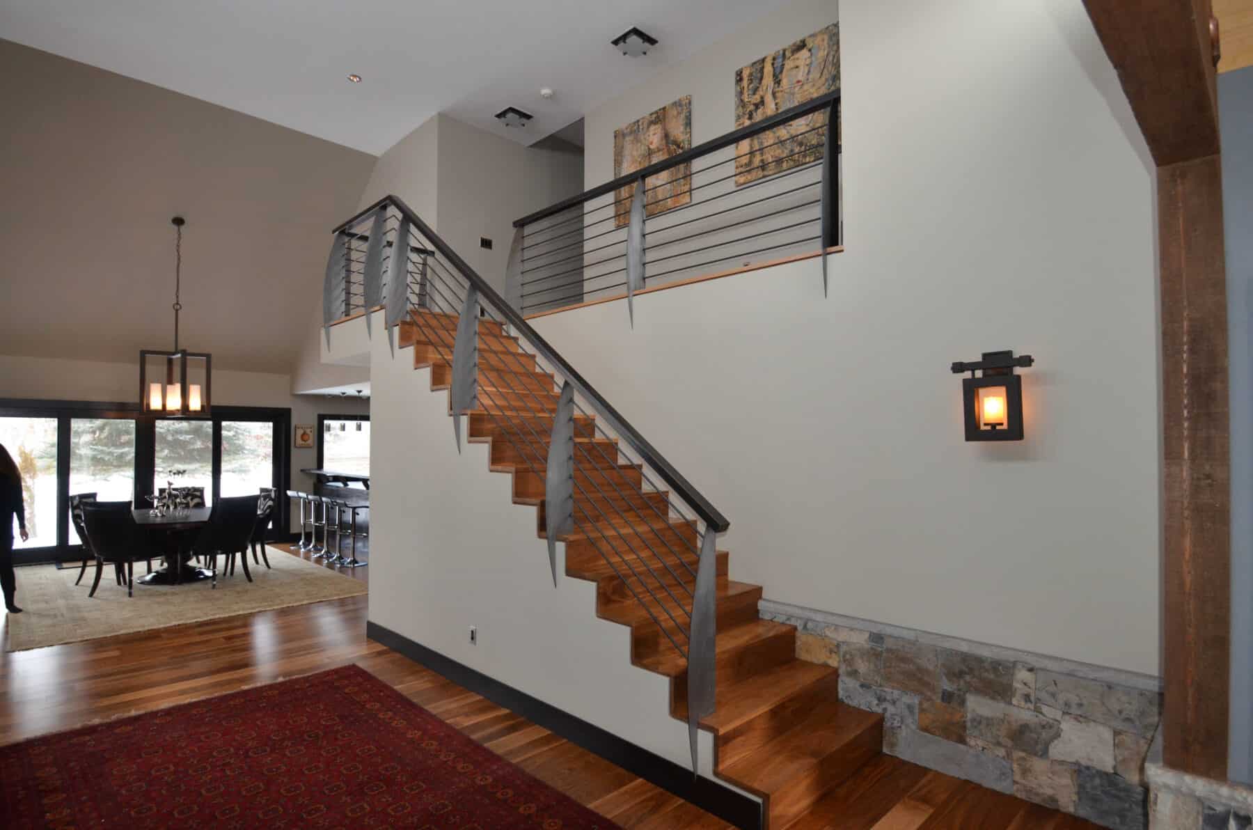 Amazing Custom Art Metal Staircase Railing with No Hardware in Aspen, Colorado Custom Home. Luxury Home Building Interiors