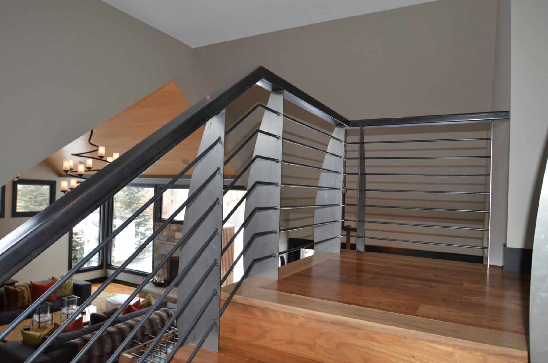 A Stunning Custom Modern Metal Art Staircase Railing in Aspen, Colorado Custom Home. Luxury Home Building Interiors