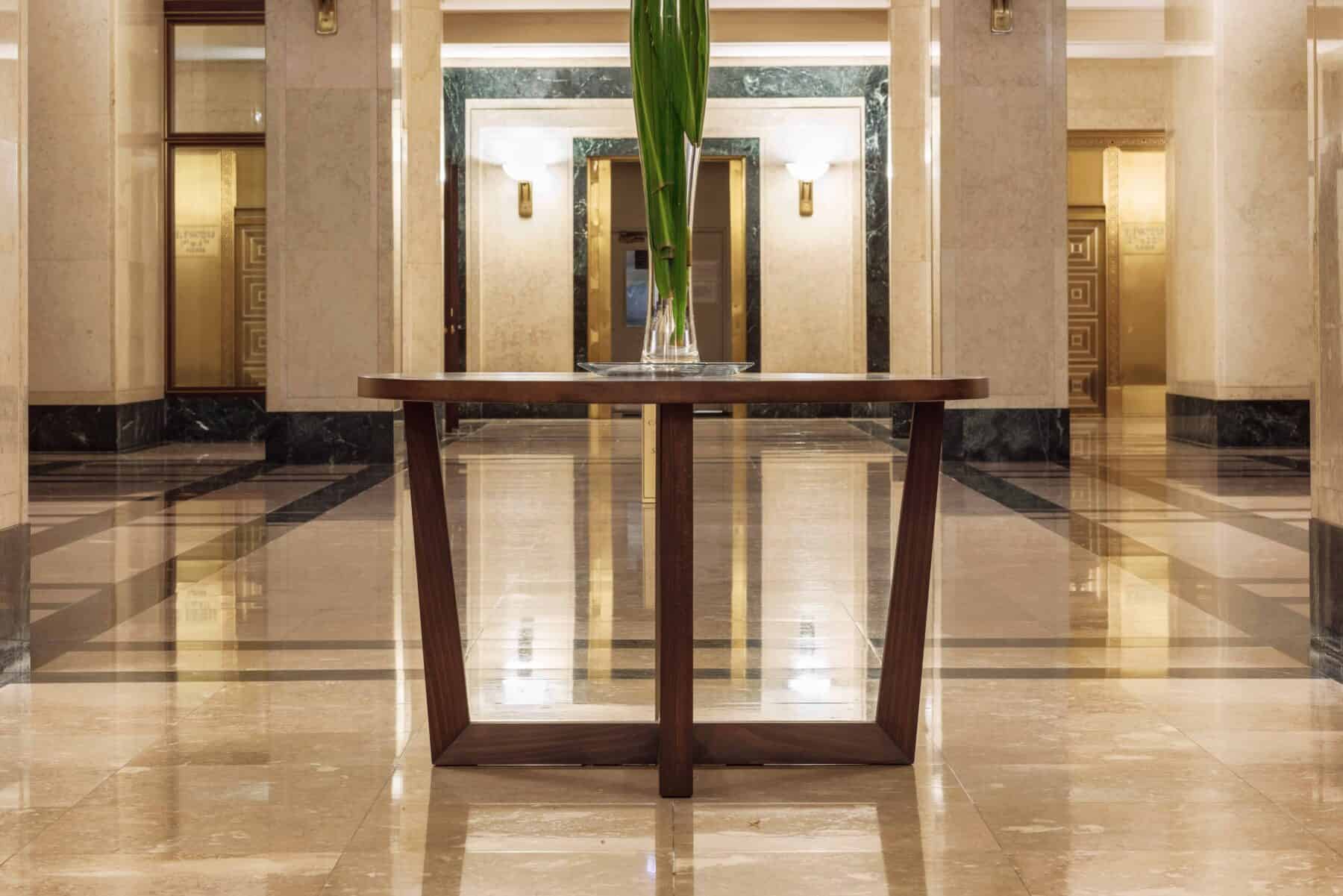 Modern Round Custom Table fpr Burnham Center Lobby Remodel by Commercial Builder & General Contractor Structural Enterprises