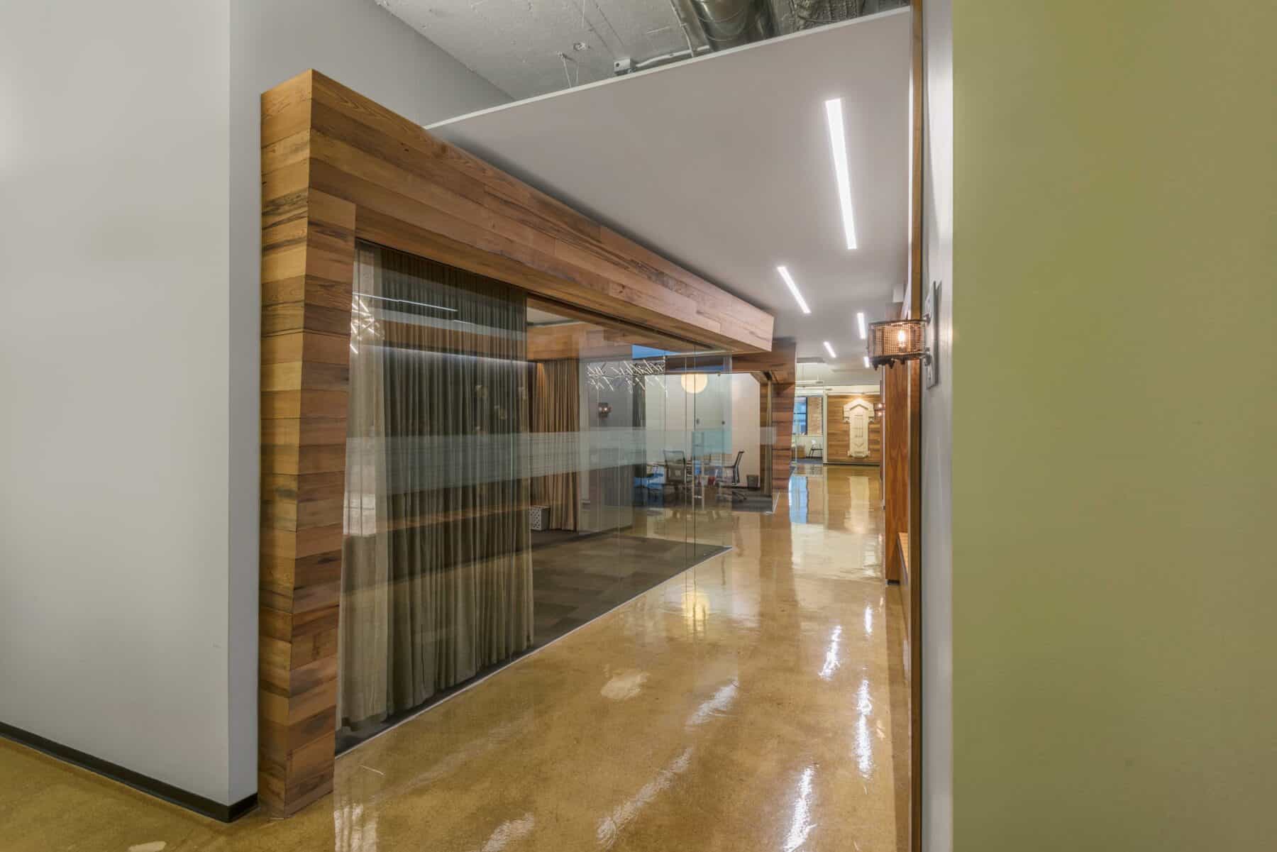 Custom Fabrication of Glass Conference Rooms with Reclaimed Wood for an Office from Construction Specialty Projects by Commercial Builder & General Contractor Structural Enterprises
