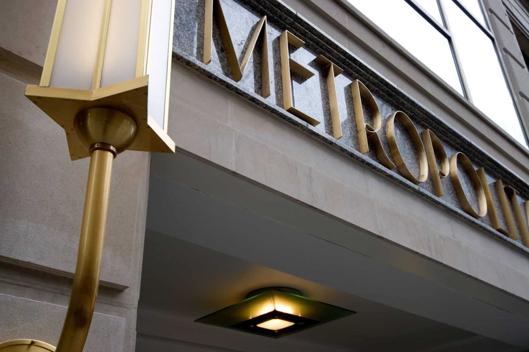 Custom Metal Fabrication of Signage and Entrance of Metropolitan Building from Construction Specialty Projects by Commercial Builder & General Contractor Structural Enterprises