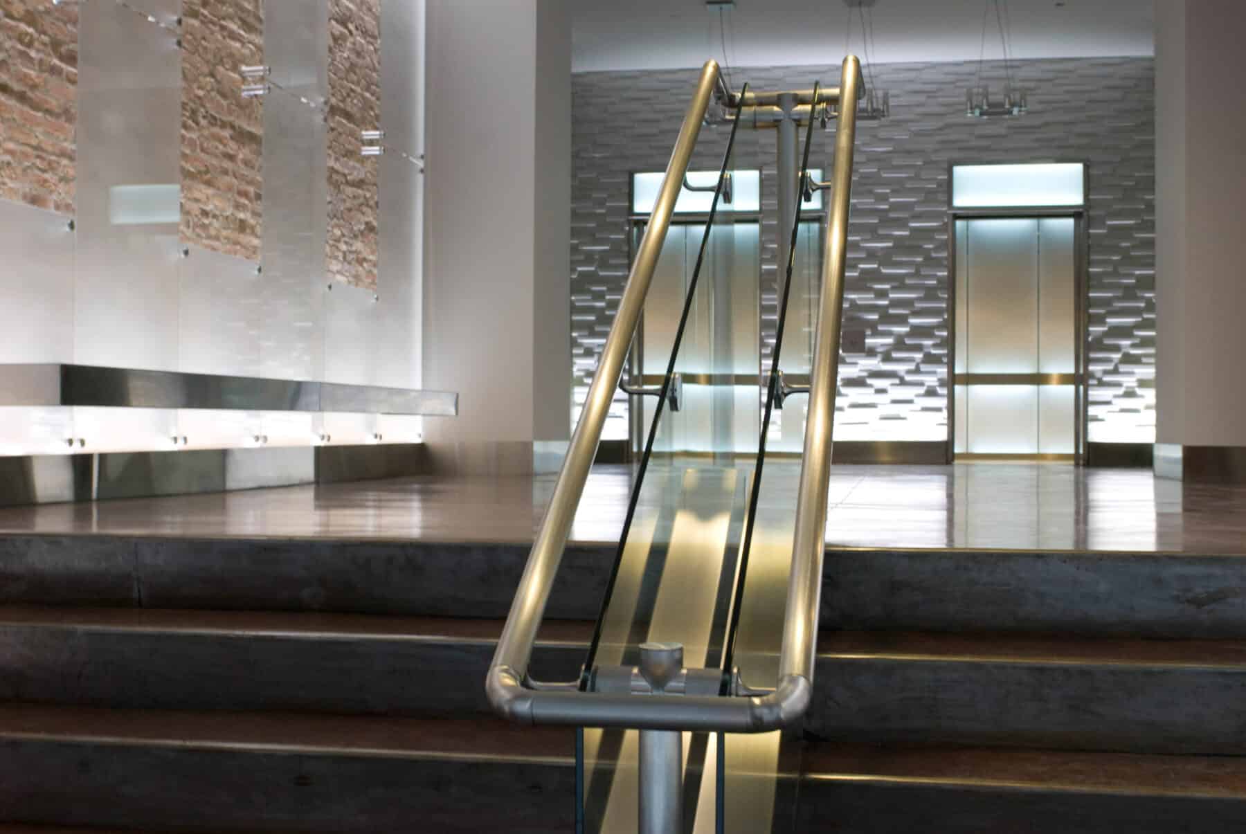 Custom Fabrication of Stainless Steel Metal and Glass Railing from Construction Specialty Projects by Commercial Builder & General Contractor Structural Enterprises
