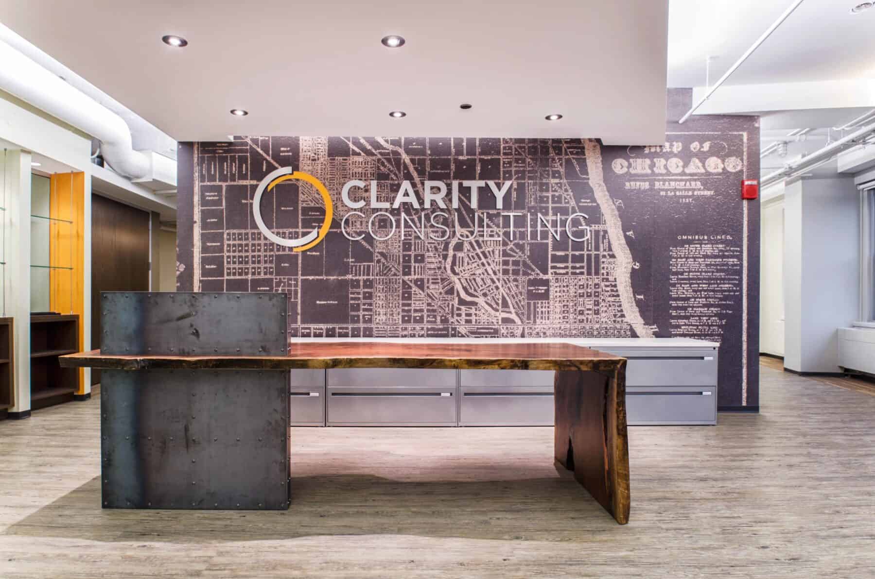Custom Fabrication of Architectural Distressed Metalwork with Rivets and Walnut Reception Desk from Construction Specialty Projects by Commercial Builder & General Contractor Structural Enterprises
