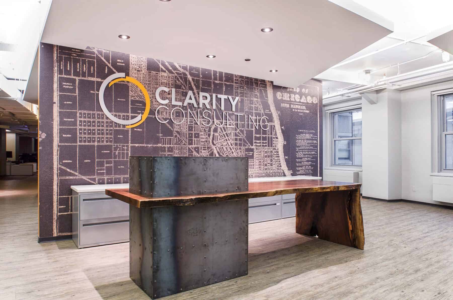 Custom Fabrication of Architectural Distressed Metalwork with Rivets and Walnut Reception Desk from Construction Specialty Projects by Commercial Builder & General Contractor Structural Enterprises