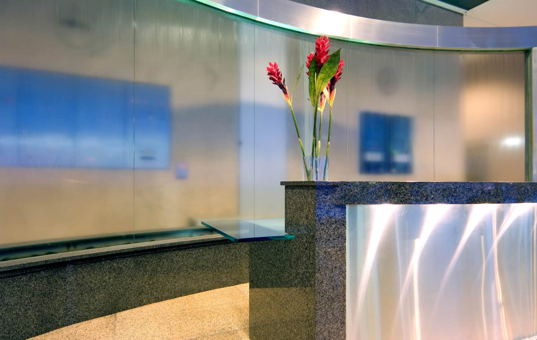 Custom Fabrication of Architectural Stainless Steel Metal, Granite and Glass Curved Water Feature from Construction Specialty Projects by Commercial Builder & General Contractor Structural Enterprises