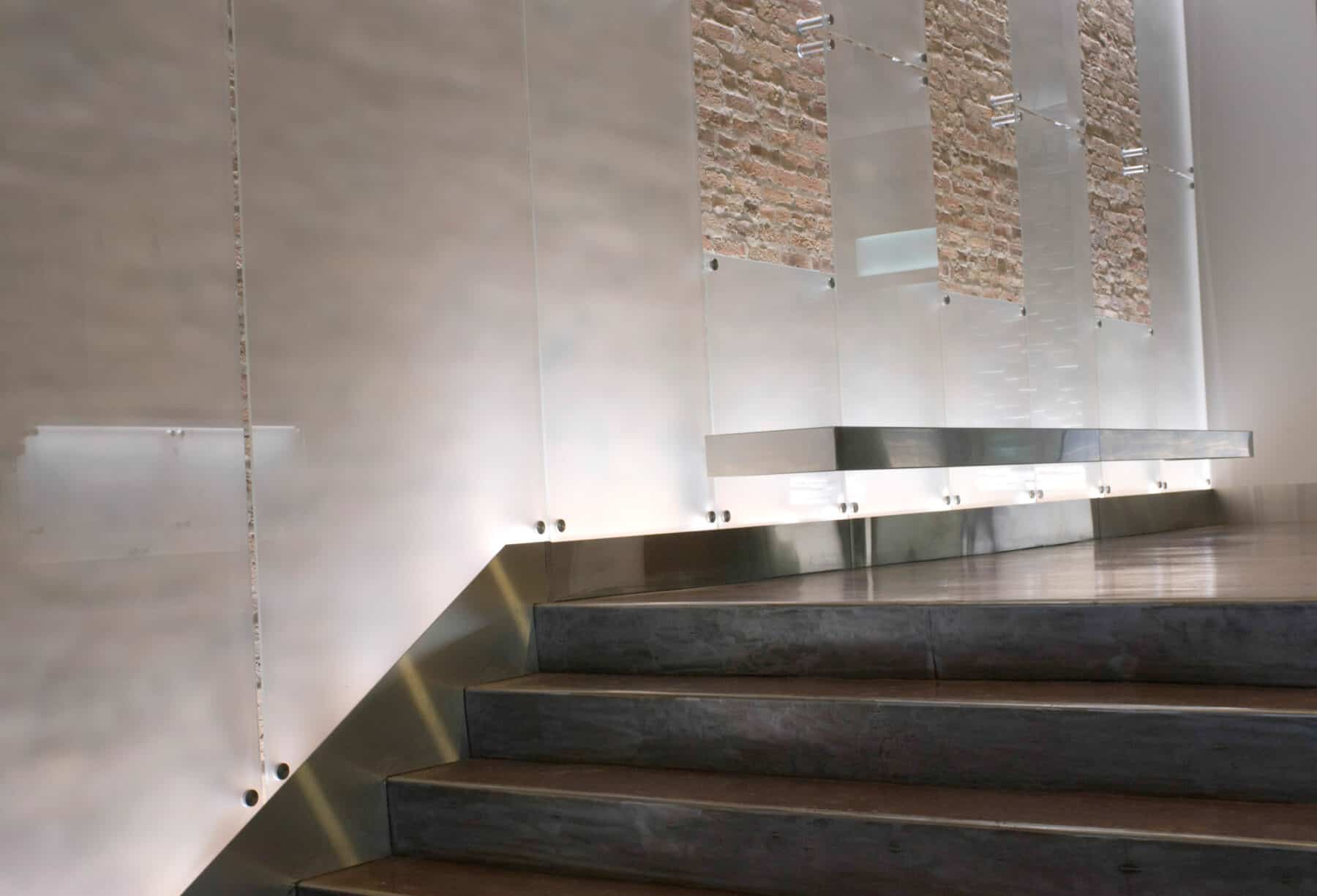 Custom Fabrication of Architectural Etched Glass Wall Panels with Special Metal Hardware with LED Lighting for Construction Specialty Projects by Commercial Builder & General Contractor Structural Enterprises