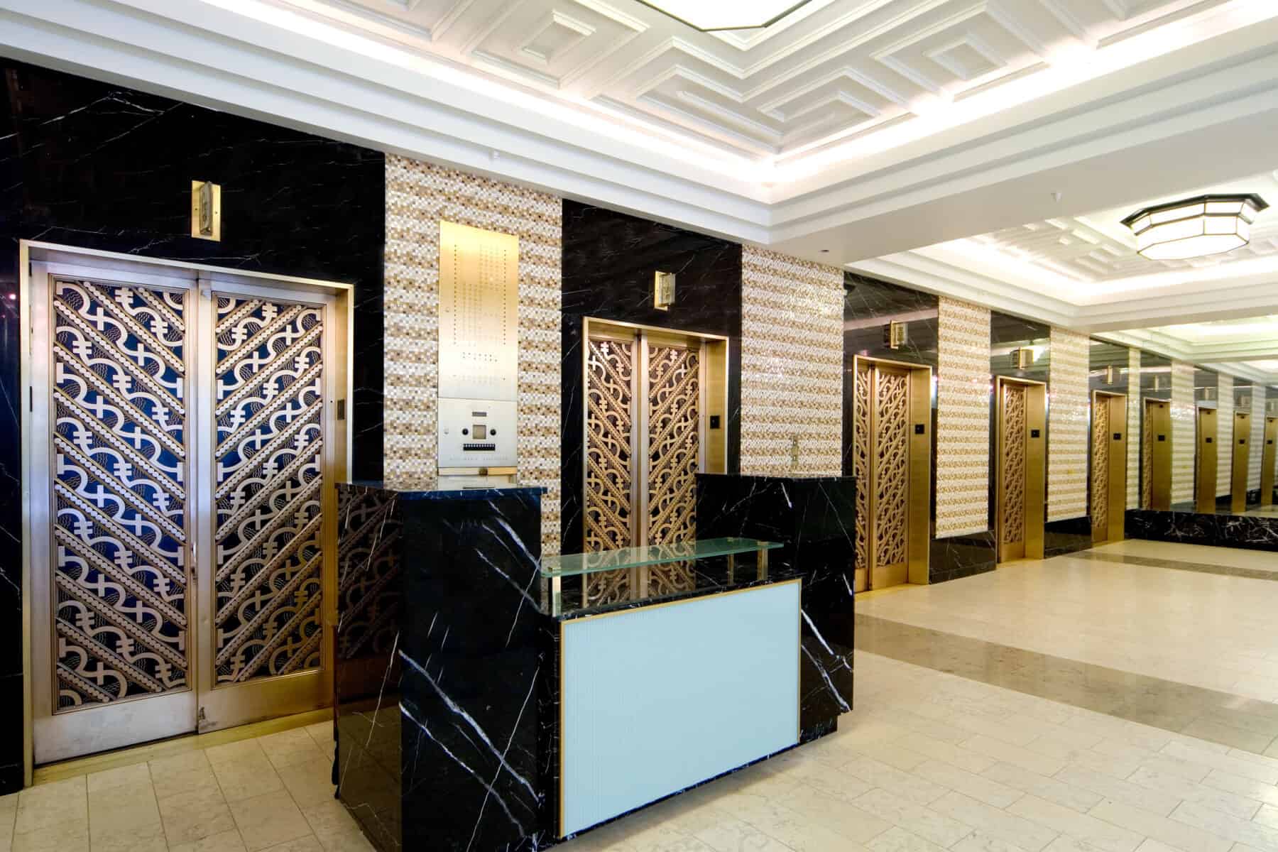 Intricate Art Deco La Salle Street Lobby Remodel Including Metal and Stonework by Commercial Builder & General Contractor Structural EnterprisesRemodel including Custom Glass Ceiling by Commercial Builder & General Contractor Structural Enterprises