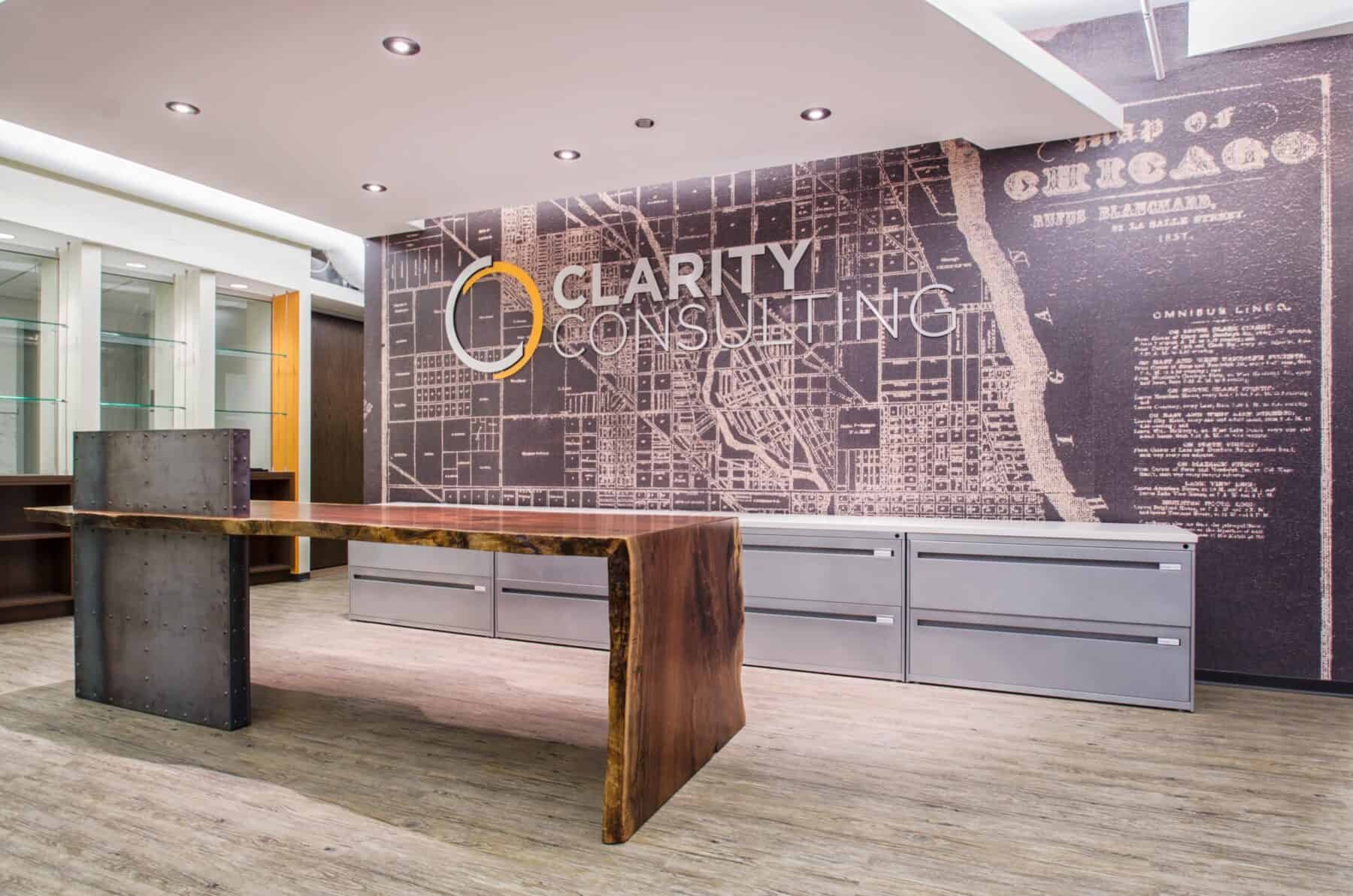 Custom Live Edge Walnut Reception Desk with Distressed Metal Base with Rivets from Construction Specialty Projects by Commercial Builder & General Contractor Structural Enterprises