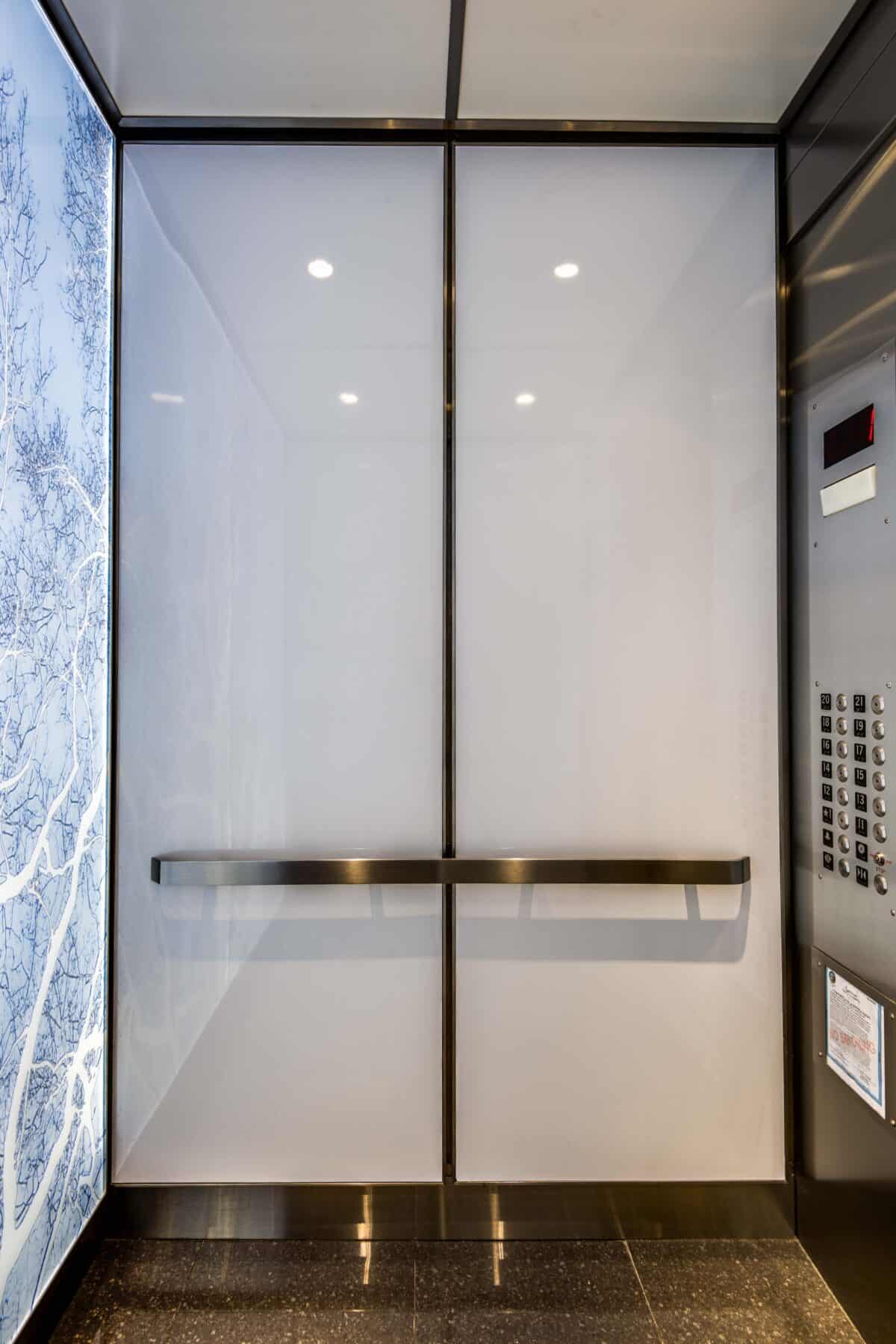 Custom Elevator Interior Remodel for Michigan Avenue Lobby by Commercial Builder & General Contractor Structural Enterprises