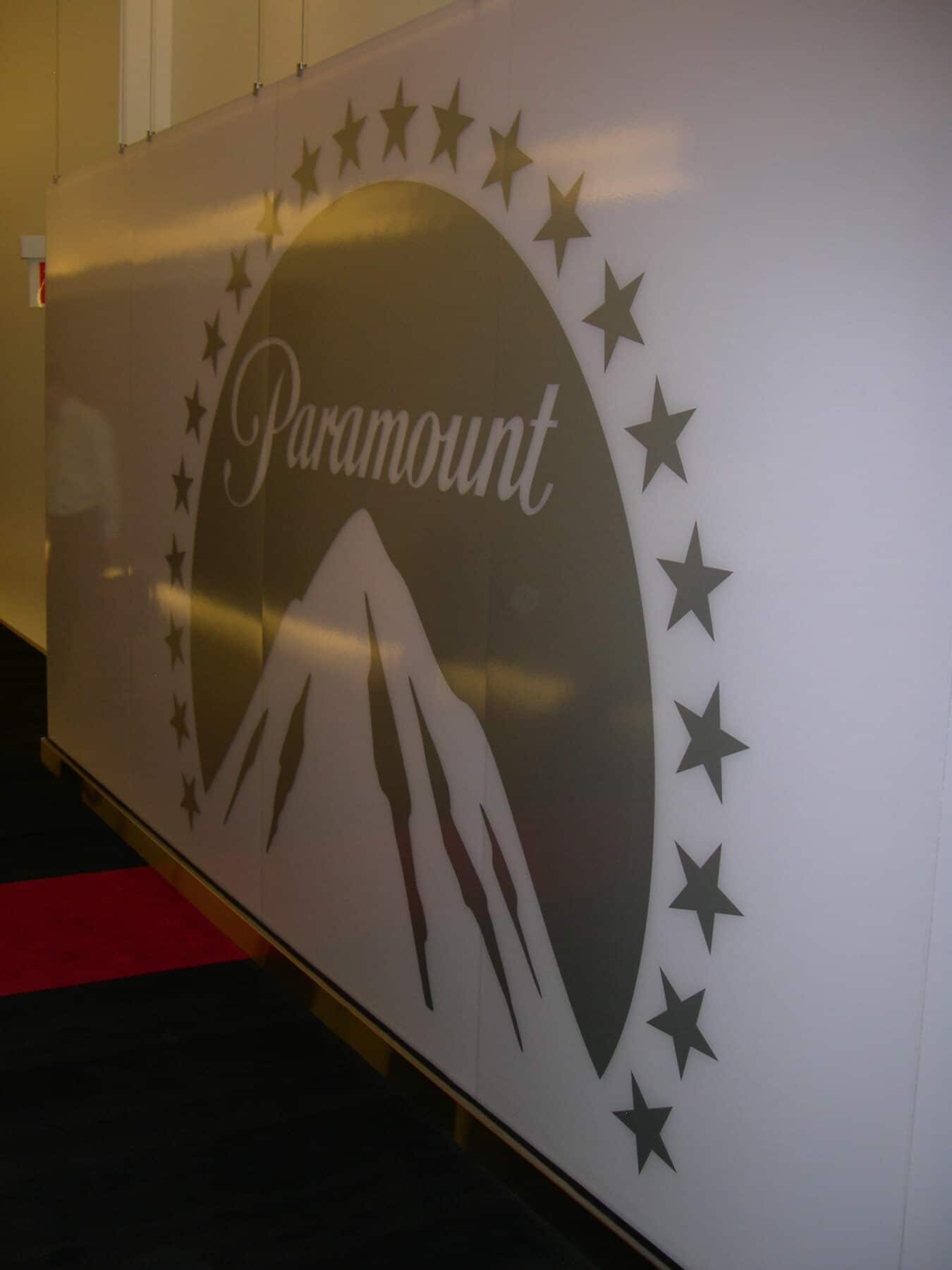 Custom Fabrication of Etched Paramount Logo Architectural Glass Accent Wall from Construction Specialty Projects by Commercial Builder & General Contractor Structural Enterprises