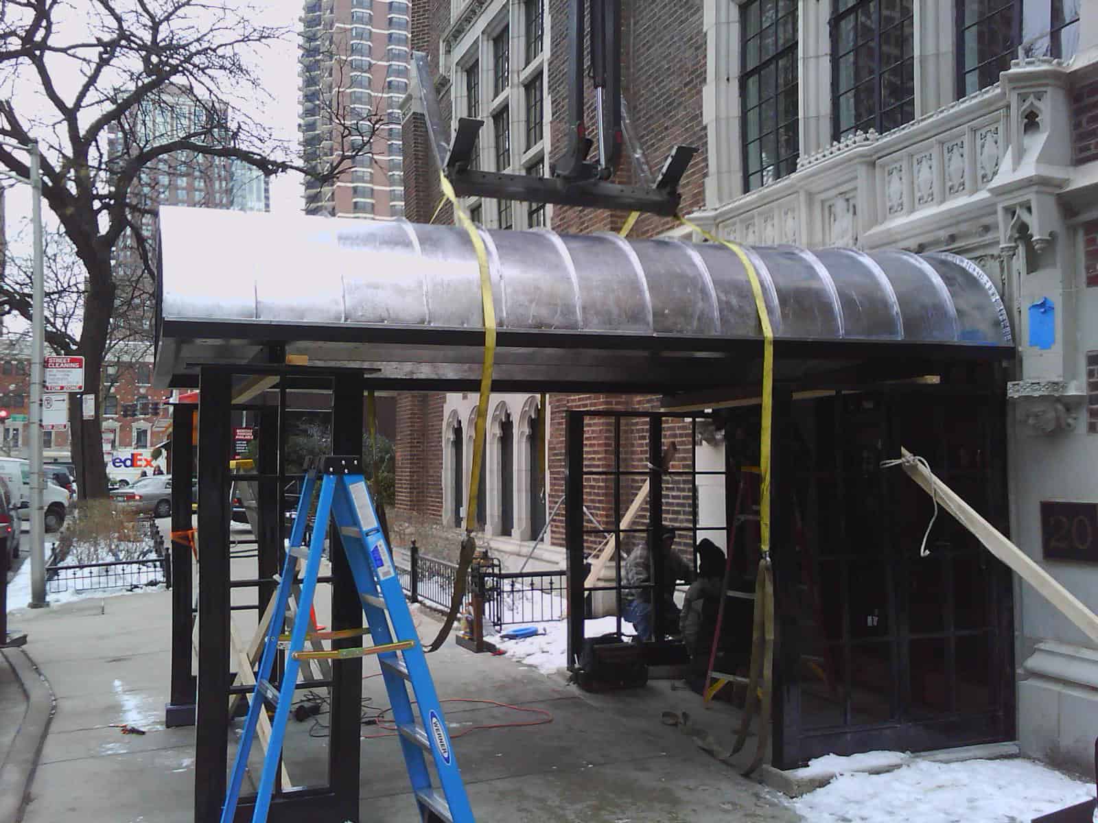 Custom Fabrication of Traditional Architectural Metal Entry Awning from Construction Specialty Projects by Commercial Builder & General Contractor Structural Enterprises