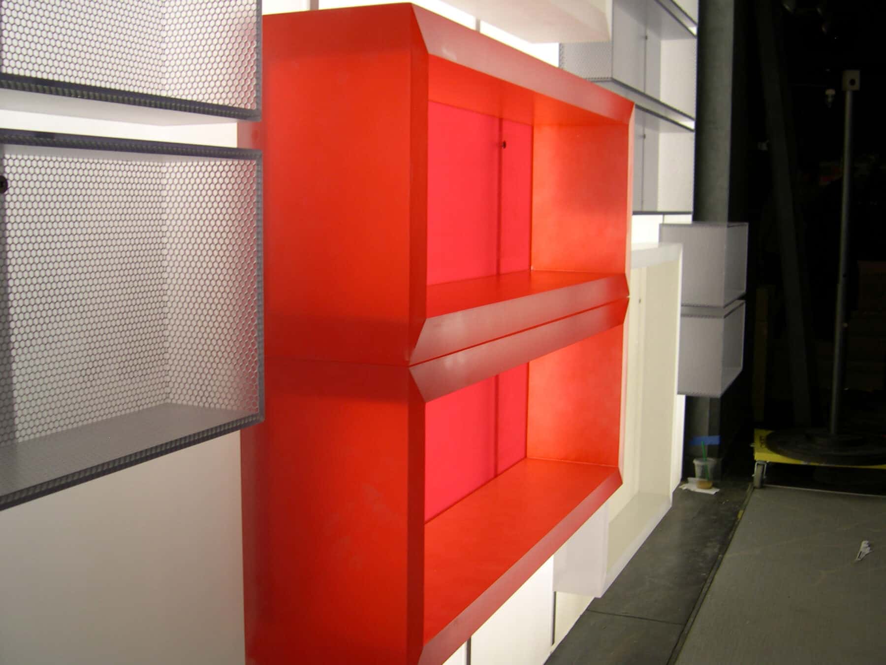 Store Display with Backlit Floating 3Form Chroma for Under Armour Store Remodel by Commercial Builder & General Contractor Structural Enterprises