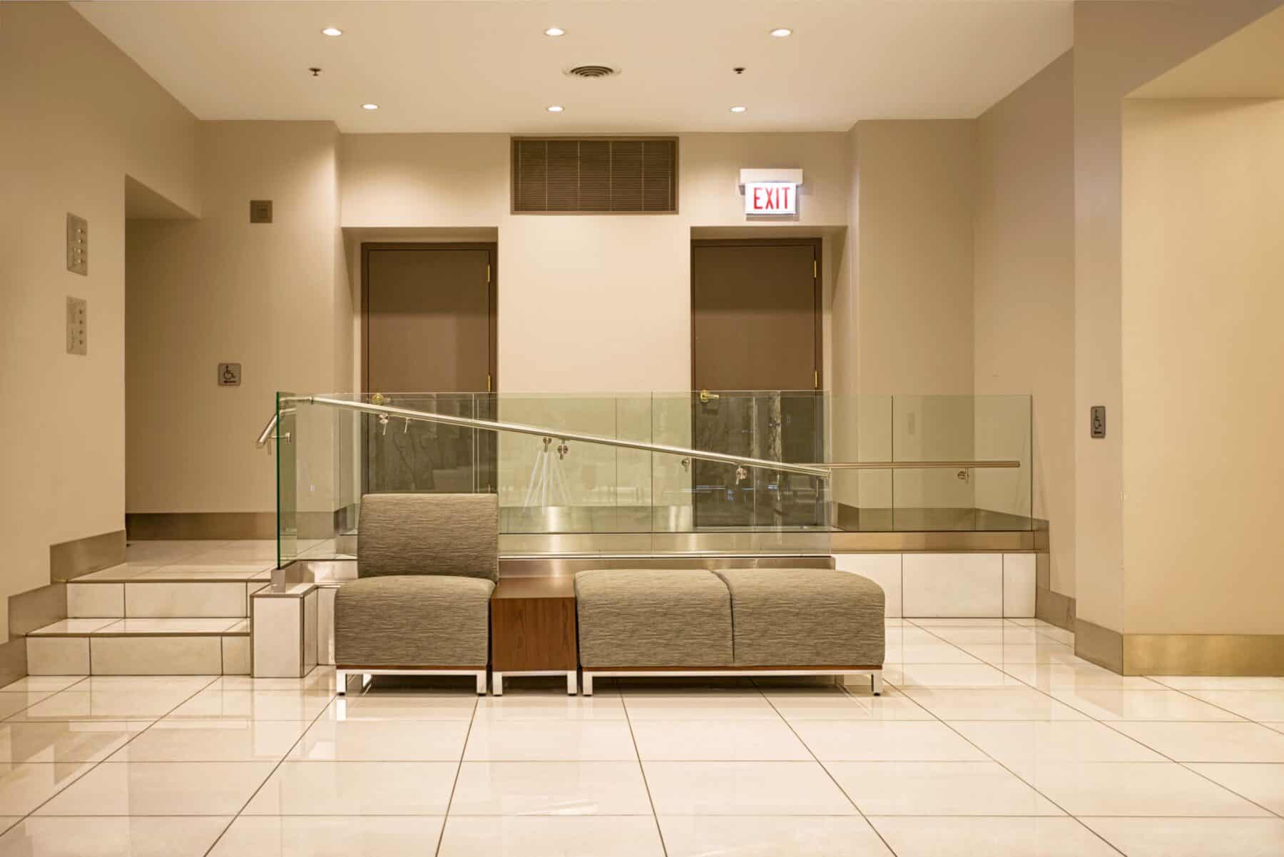 Custom Glass and Metal Railing for Wells Lobby Remodel by Commercial Builder & General Contractor Structural Enterprises